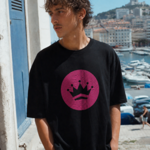 Man in a KingBaby crown t-shirt.